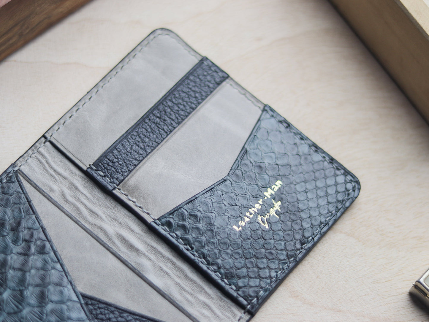 BRIXTON - IRIDIUM GRAY PYTHON SKIN