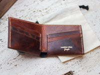 ATTICUS - Whisky Brown Veg Tan Waxed Pull Up Leather
