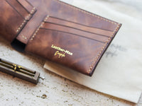 ATTICUS - Rusty Brown Veg Tan Waxed Pull Up Leather