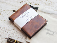 ATTICUS - Rusty Brown Veg Tan Waxed Pull Up Leather